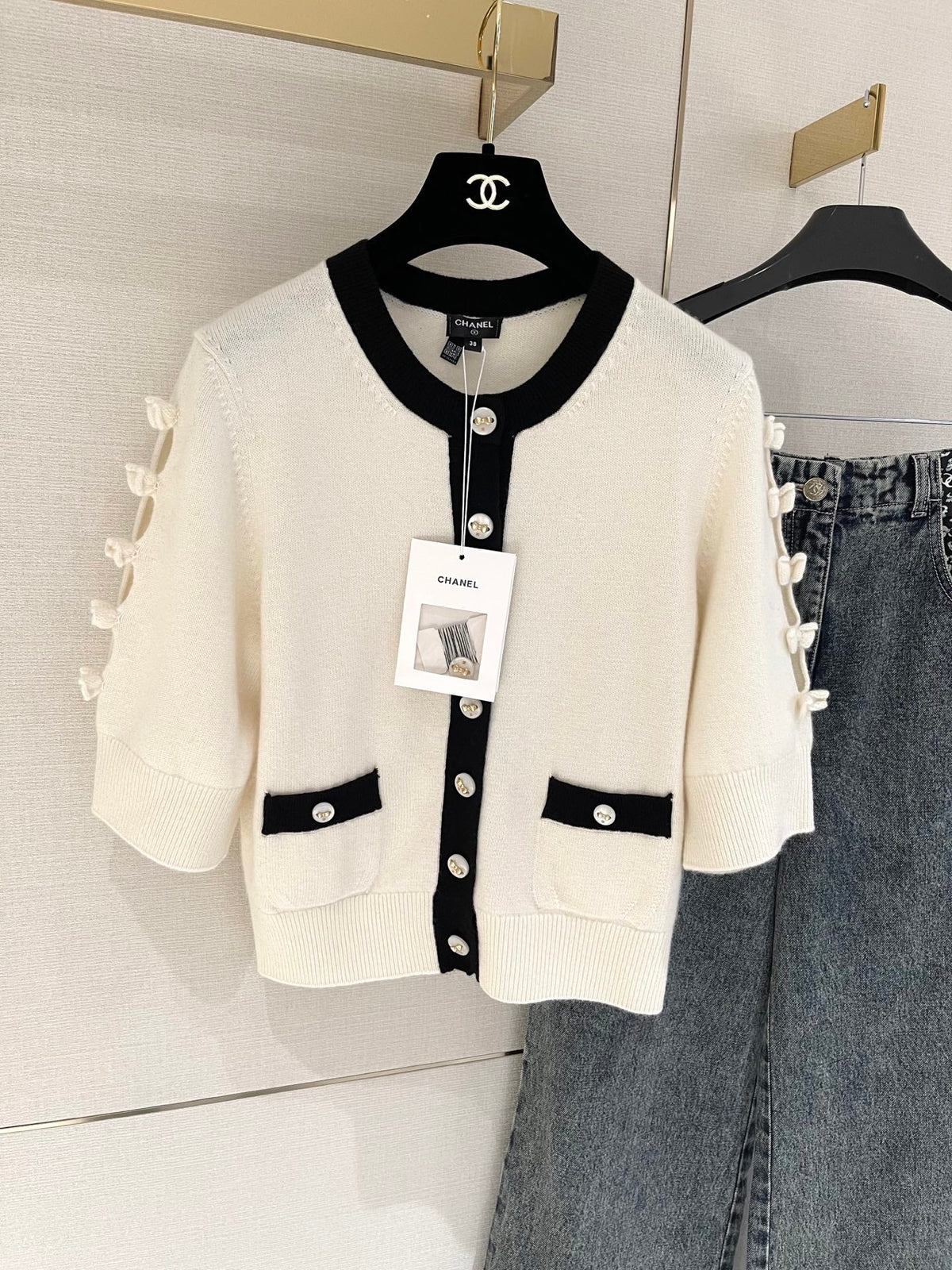 Bow-tie openwork cashmere cardigan with short sleeves