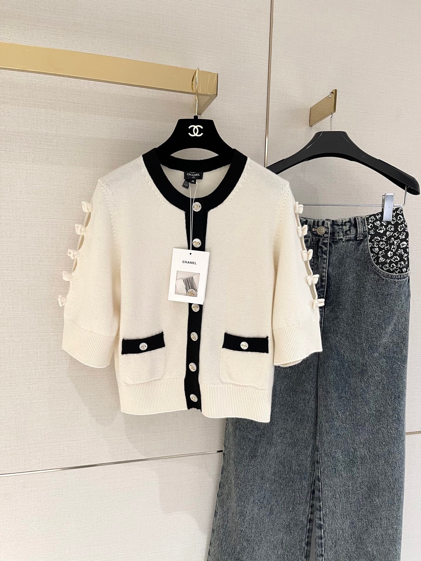 Bow-tie openwork cashmere cardigan with short sleeves