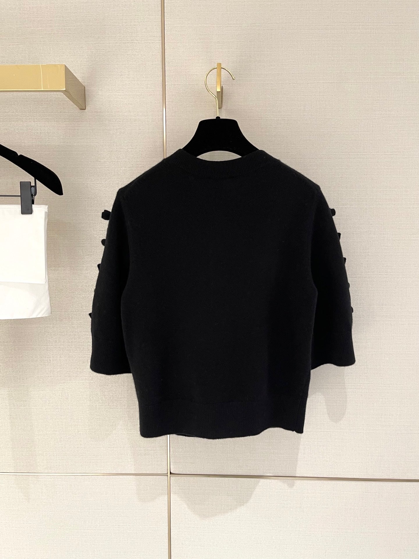 Bow-tie openwork cashmere cardigan with short sleeves