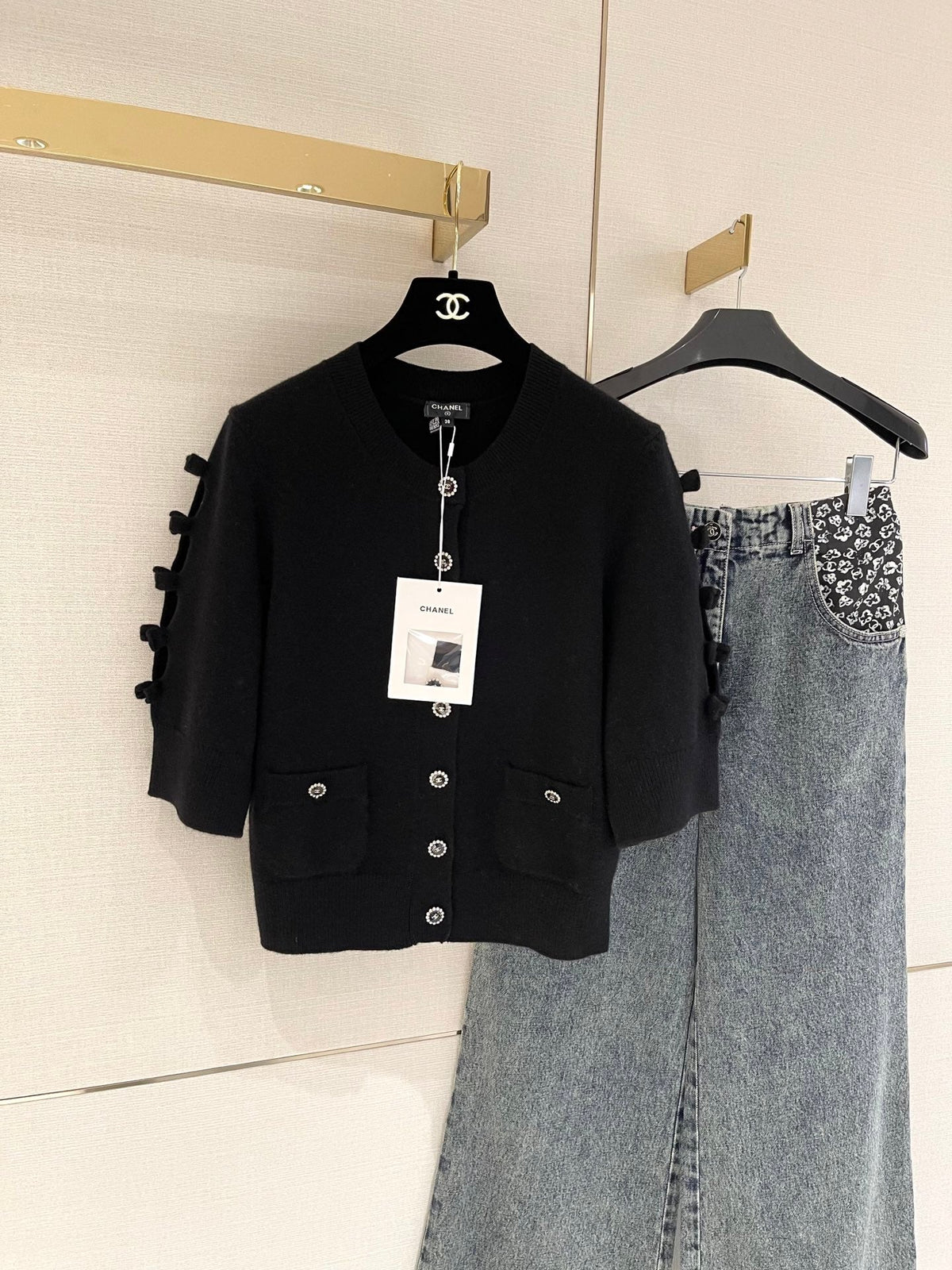 Bow-tie openwork cashmere cardigan with short sleeves