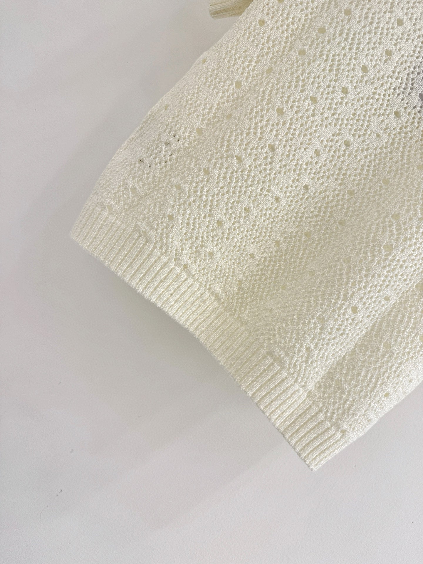 Openwork short-sleeved knit sweater