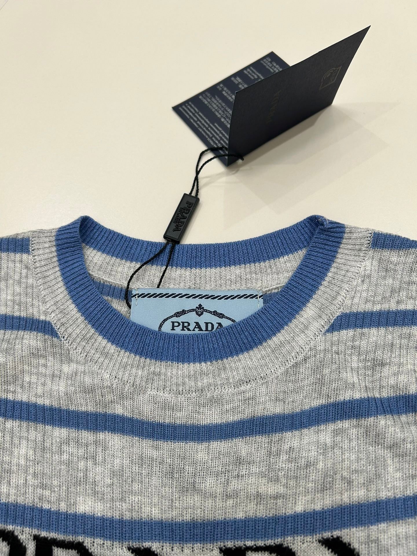 Striped wool knit short-sleeved top