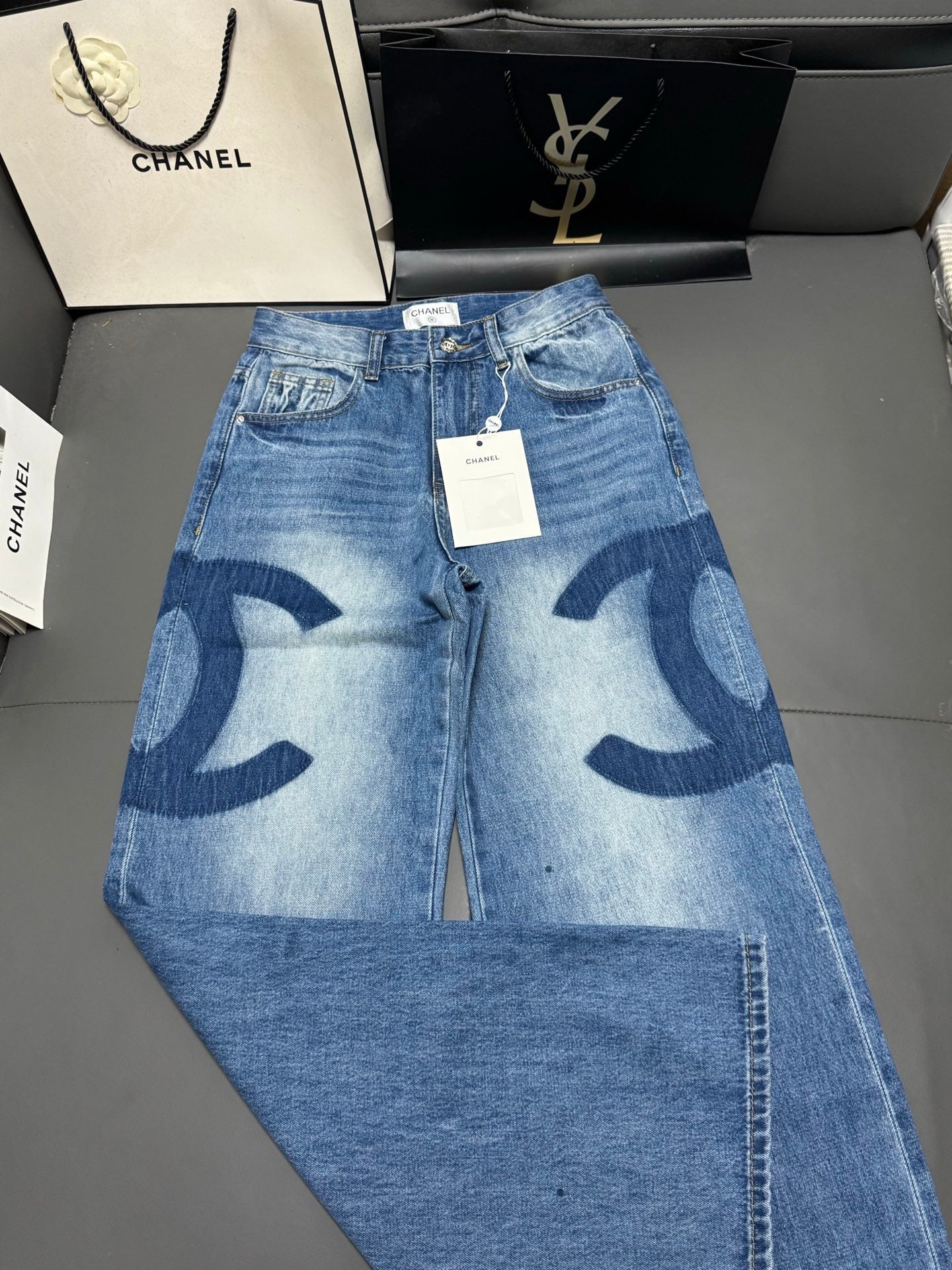 Straight-leg jeans with a "shadow logo" design