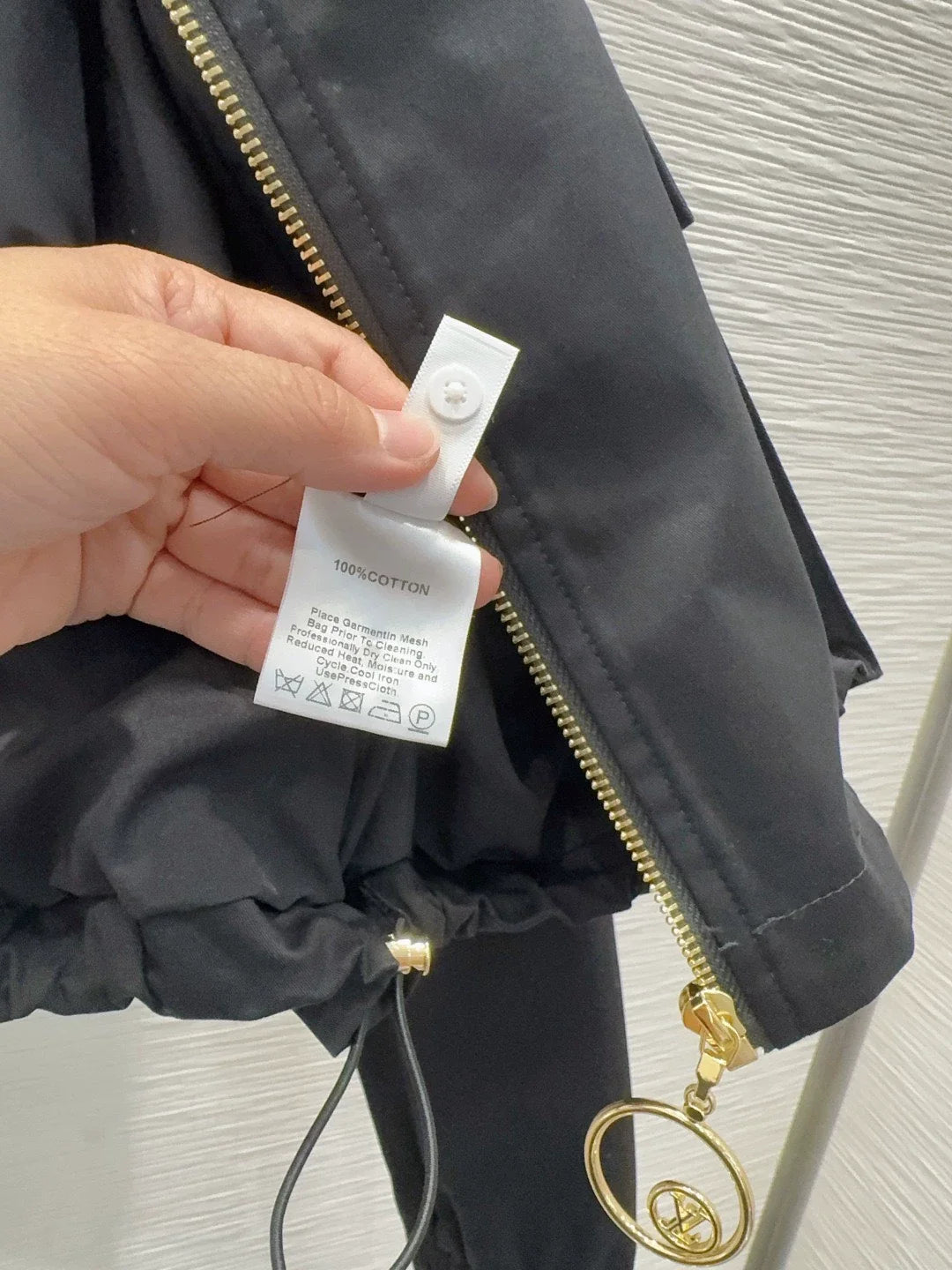 26New Long-Sleeve Jacket with Pockets, Drawstring, and Zipper