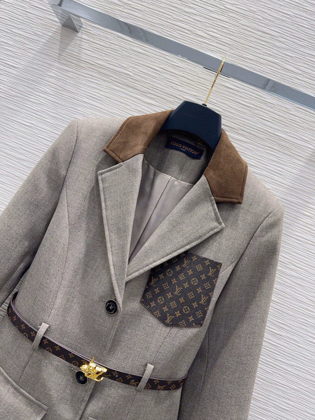26Long-Sleeve Blazer with Contrast-Color Logo, Pockets, and Waist Belt