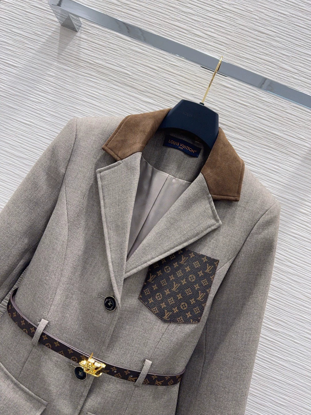 26Long-Sleeve Blazer with Contrast-Color Logo, Pockets, and Waist Belt