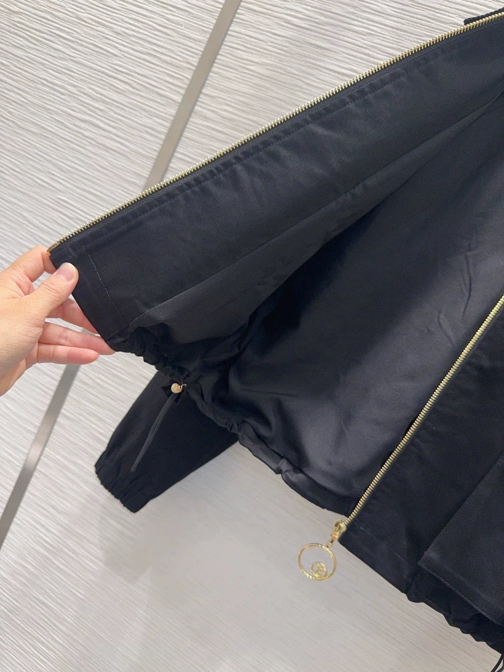 26New Long-Sleeve Jacket with Pockets, Drawstring, and Zipper