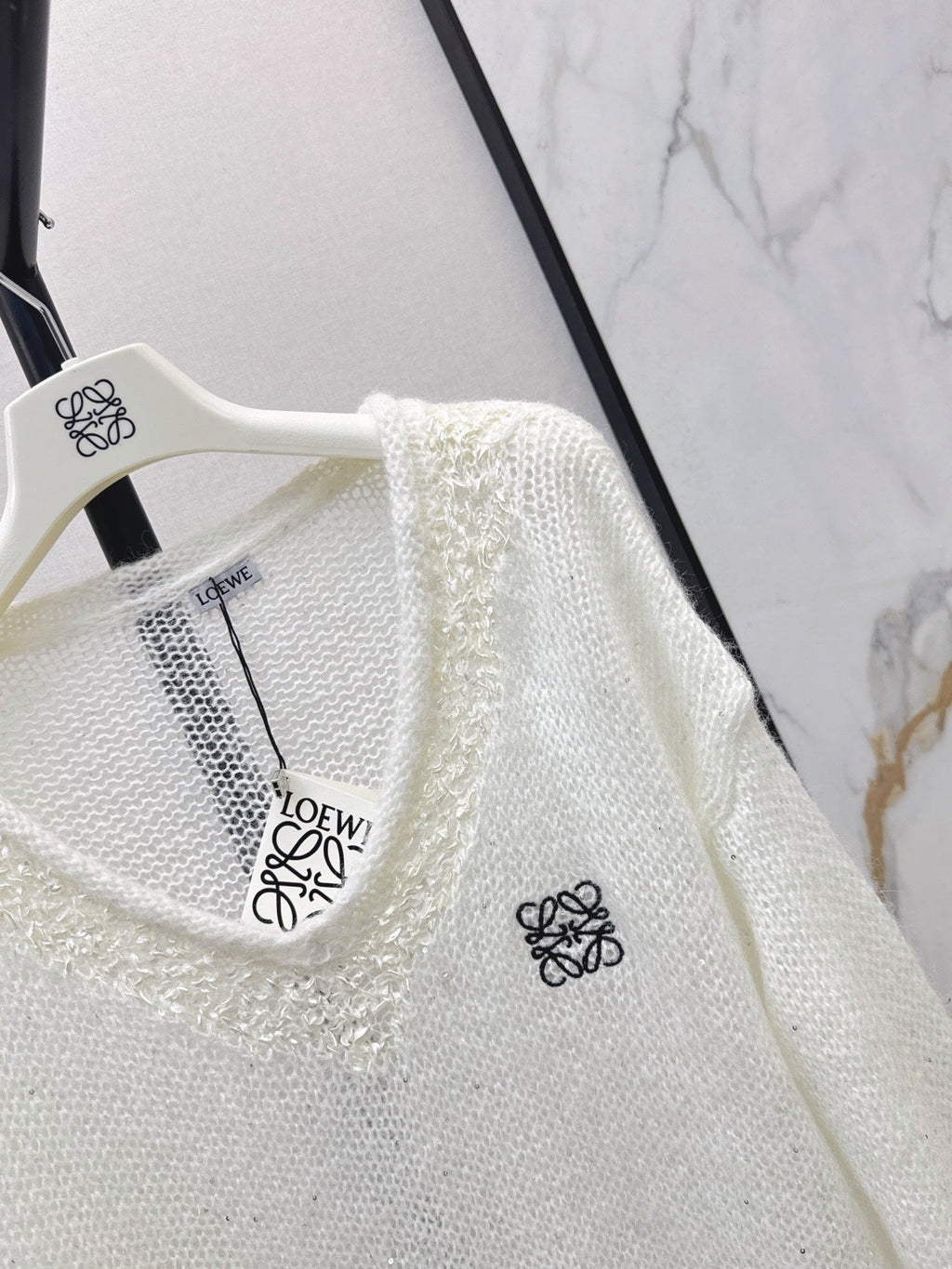 26FW Long-sleeve knit top with cut-out detail and new logo embroidery 🤍