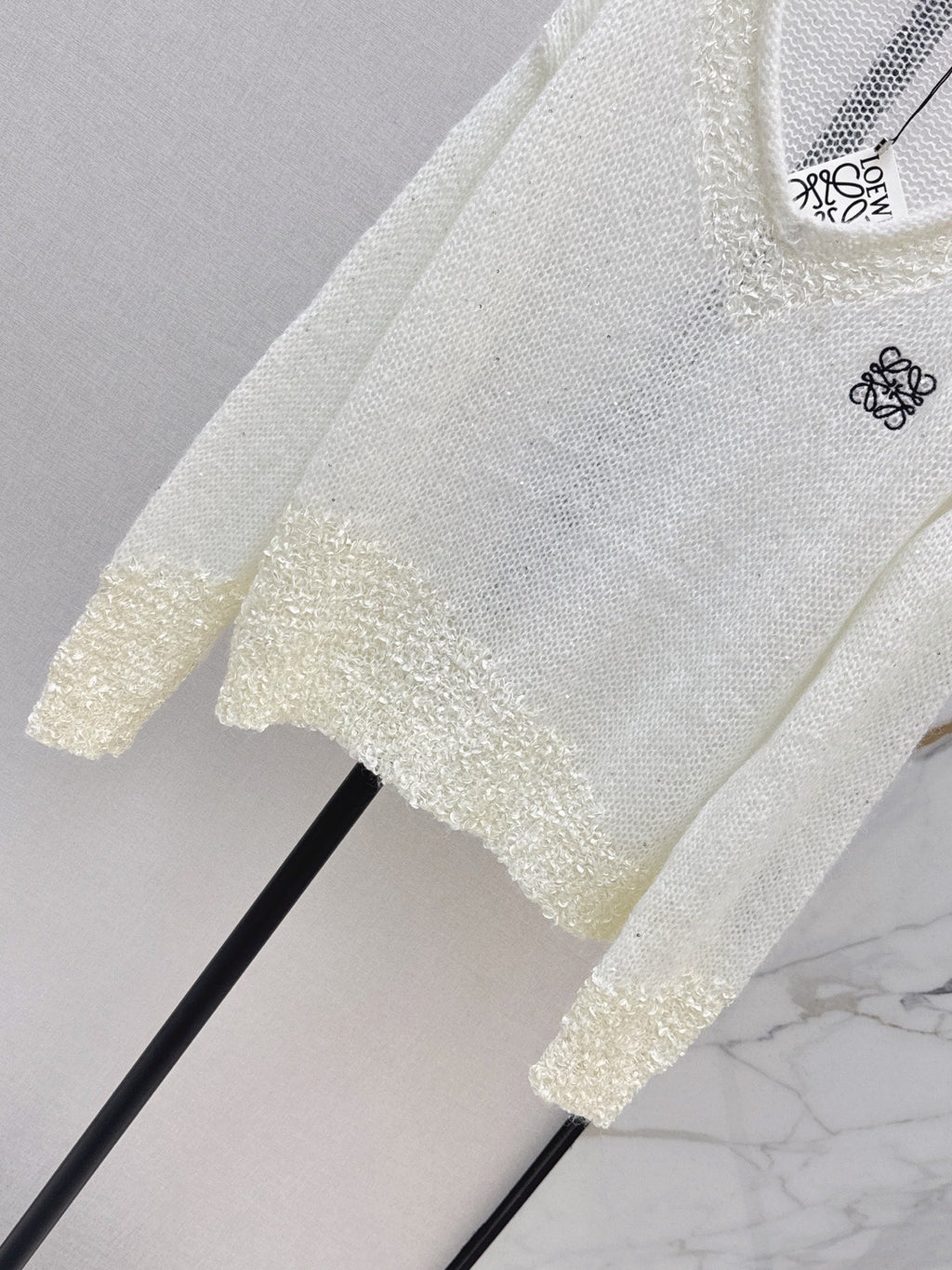 26FW Long-sleeve knit top with cut-out detail and new logo embroidery 🤍